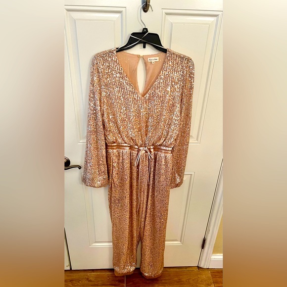 Aaron and Amber from New York & Company Pants - Blush sequin jogger jumpsuit.